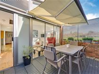 MODERN HOME WITH OPEN FLOOR PLAN OVERLOOKS KENSINGTON MEMORIAL PARK