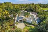WELL-MAINTAINED POOL HOME WITH GOLF AND LAKE VIEWS