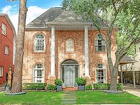 TWO-STORY BRICK DESIGNER'S HOME WITH TASTEFUL UPDATES