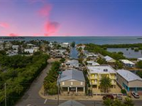 WATERFRONT CORNER LOT HOME