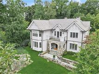 STUNNING SUN-FILLED SIX BEDROOM CUSTOM HOME