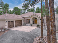 CUSTOM HOME POISED ON AN ELEVATED 2.5 ACRES