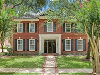 HANDSOME TRADITIONAL BRICK HOME ON LOVELY CORNER LOT