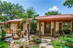 BEAUTIFULLY UPDATED HOME WITH STUNNING GARDENS AND KOI POND