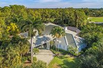 WELL-MAINTAINED POOL HOME WITH GOLF AND LAKE VIEWS