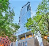 GRAND HALF-FLOOR CONDO