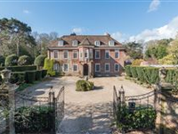 IMPRESSIVE JACOBEAN ERA MANOR SURROUNDED BY GROOMED GARDENS