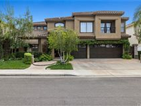 ELEGANT AND LUXURIOUS EXECUTIVE HOME IN GATED OCEAN RANCH COMMUNITY