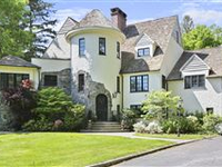 PRIVATE LAKEFRONT FIVE-BEDROOM ENGLISH TUDOR