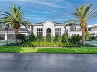 REIMAGINED ESTATE IN A LANDSCAPED TROPICAL GARDEN