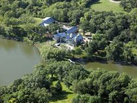 ARCHITECTURAL MASTERPIECE ON SEVEN-PLUS ACRES
