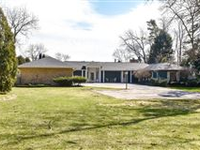 SPRAWLING LAKE-LEVEL RANCH WITH STUNNING MILWAUKEE SKYLINE VIEWS