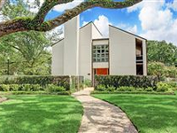 BEAUTIFUL CONTEMPORARY MASTERPIECE ON LARGE CORNER LOT WITH MAJESTIC OAK TREES