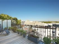 THIS SPLIT LEVEL APARTMENT WITH TERRACE ENJOYS AN OPEN VIEW OF PARIS AND THE EIFFEL TOWER