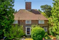 HANDSOME BRICK FAMILY HOME WITH TRADITIONAL FEATURES