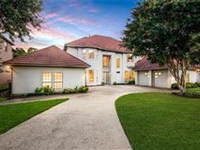 BRIGHT AND BEAUTIFUL HOME WITH PANORAMIC CREEK VIEWS