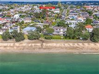 TROPHY LOCATION STEPS FROM TAKAPUNA BEACH