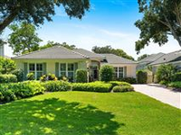 METICULOUSLY RENOVATED COURTYARD HOME OVERLOOKING THE LAKE