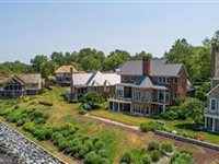 SHOW STOPPING UNOBSTRUCTED SOUTH RIVER VIEWS IN THIS IMMACULATE HOME