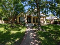 CHARMING ROCK AND BRICK FRENCH COUNTRY ESTATE ON NEARLY 5 WOODED ACRES