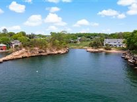 BEAUTIFUL HOME IN ENVIABLE WATERFRONT LOCATION