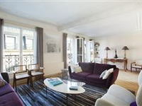 ATYPICAL SPLIT-LEVEL APARTMENT ON THE TOP TWO FLOORS