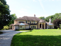 CUSTOM MANOR ON NEARLY EIGHT ACRES