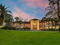 CONTEMPORARY ELEGANCE WITH NEARLY FIVE ACRES ON THE VERMILION RIVER