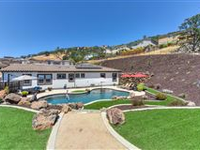 GORGEOUS HOME IN A PREMIER GATED COMMUNITY WITH PRIVATE COURTYARD ACCESS