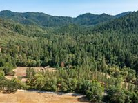 BEAUTIFULLY REMODELED HOME ON THE BANKS OF E EVANS CREEK