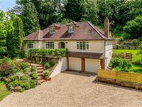 UNIQUE AND VERSATILE HOME IN A TUCKED AWAY BUT CONVENIENT LOCATION