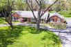 SPRAWLING RANCH SET IN BEAUTIFUL AREA IN BLOOMFIELD HILLS