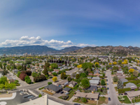 PENTHOUSE WITH SERENE MOUNTAIN VIEWS IN THE HEART OF KELOWNA