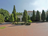 BOLD DRAMATIC RESIDENCE ON NEARLY TWO PRIME ACRES