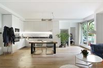 SLEEK AND PLEASANT APARTMENT IN WELL-MAINTAINED CONDOMINIUM WITH LANDSCAPED GARDEN