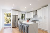 BEAUTIFULLY DESIGNED TWO FAMILY TOWNHOME