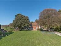 A CHARMING COUNTRY HOUSE OF SOME DISTINCTION, SET IN PRIVATE LOCATION IN STUNNING GARDENS