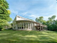 ARCHITECTURALLY STUNNING CUSTOM RIVERFRONT HOME