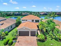 PREMIUM NORTH NAPLES LAKEFRONT GEM WITH OVERSIZED LANAI