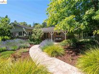THIS IMPECCABLY LANDSCAPED RANCH HAS BEEN TASTEFULLY REMODELED THROUGHOUT