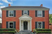 LOVELY TWO-STORY BRICK IDEALLY LOCATED