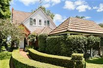 MUCH LOVED HOME IN EXCLUSIVE ENCLAVE