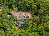 SPECTACULAR LAKE DREAM HOME WITH MULTI-MILLION DOLLAR VIEWS