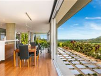EXCEPTIONAL HIGH QUALITY HOME ELEVATED ABOVE THE SURROUNDING LANDSCAPE