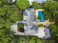 CUSTOM HOME WITH SLEEK DESIGNER TOUCHES