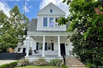 LOVELY UPTOWN HOME WITH CLASSIC ARCHITECTURAL DETAILING THROUGHOUT