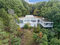 A PRIVATE LAKEFRONT OASIS IN AN EXCLUSIVE GATED COMMUNITY