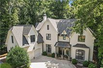EXCEPTIONAL HOME SURROUNDED BY NATURE ON PRIVATE STREET
