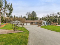 STUNNING CORNER ACREAGE IN SUNNY GRANDVIEW HEIGHTS