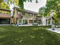 SLEEK MID-CENTURY MODERN HOME OVERLOOKING BUFFALO CREEK